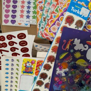 Bin of stickers and note pads
